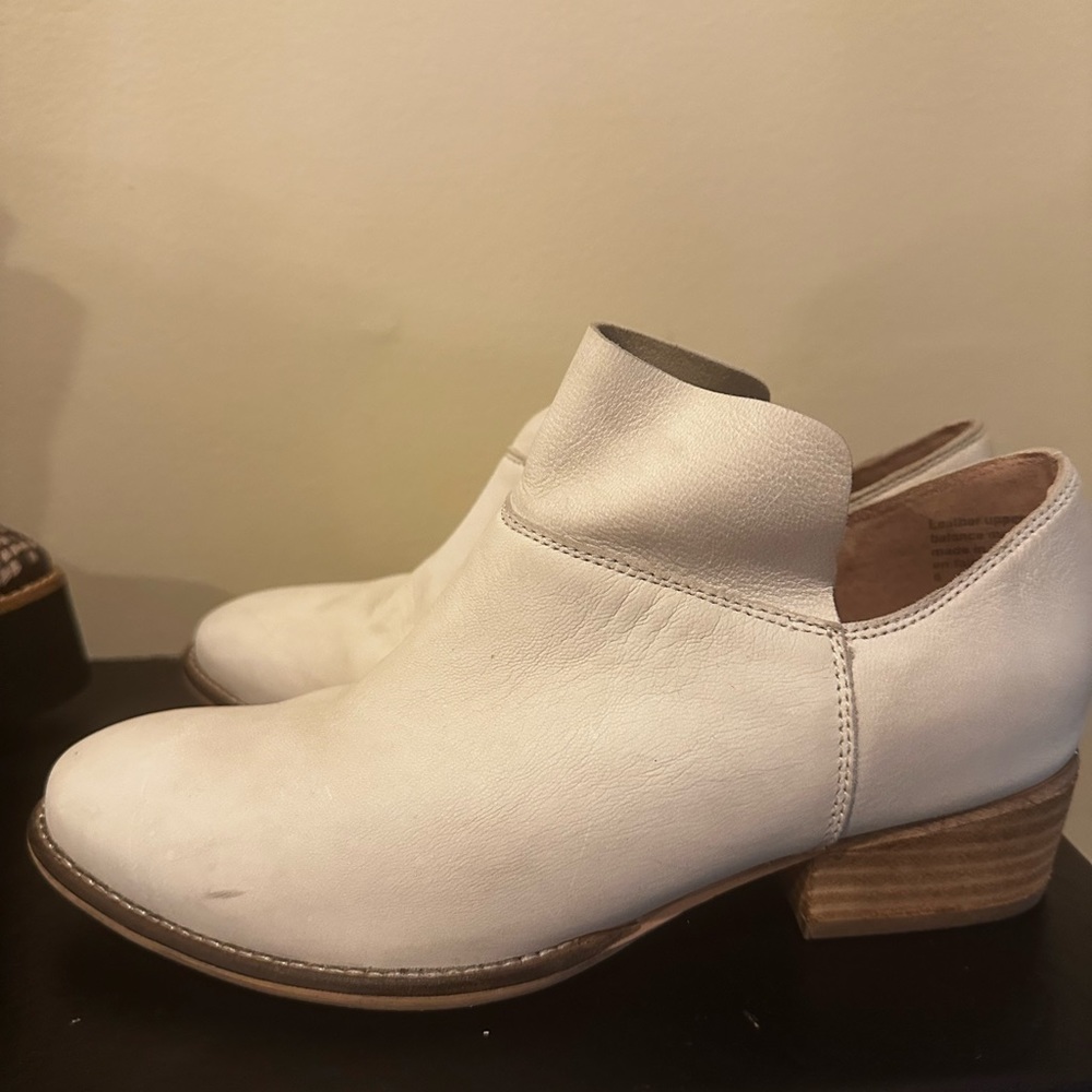 Chalk white ankle boots.
